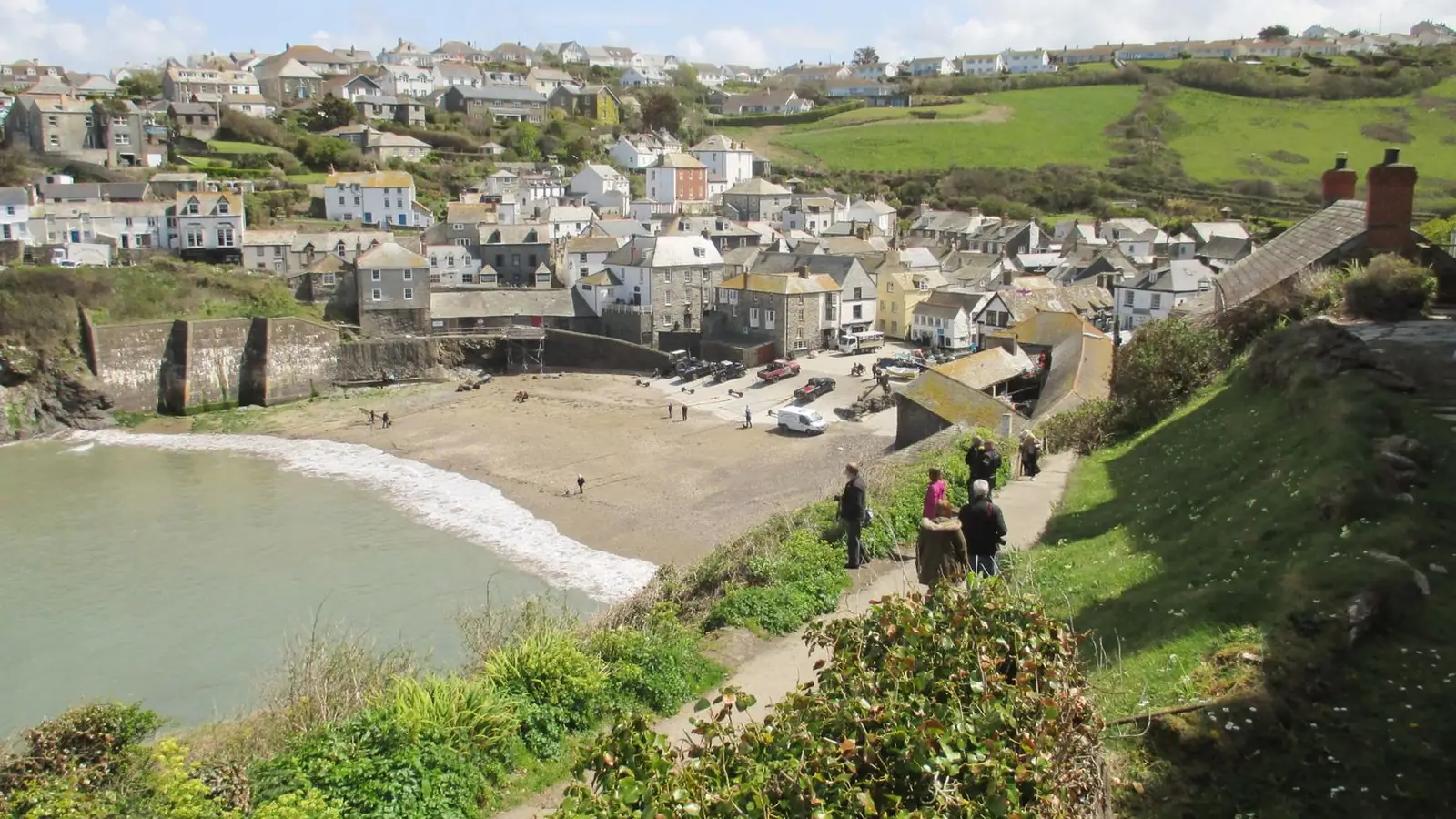 Houses on Roscarrock Hill seen across Port Isaac harbour – Bert Large's restaurant terrace is among them.