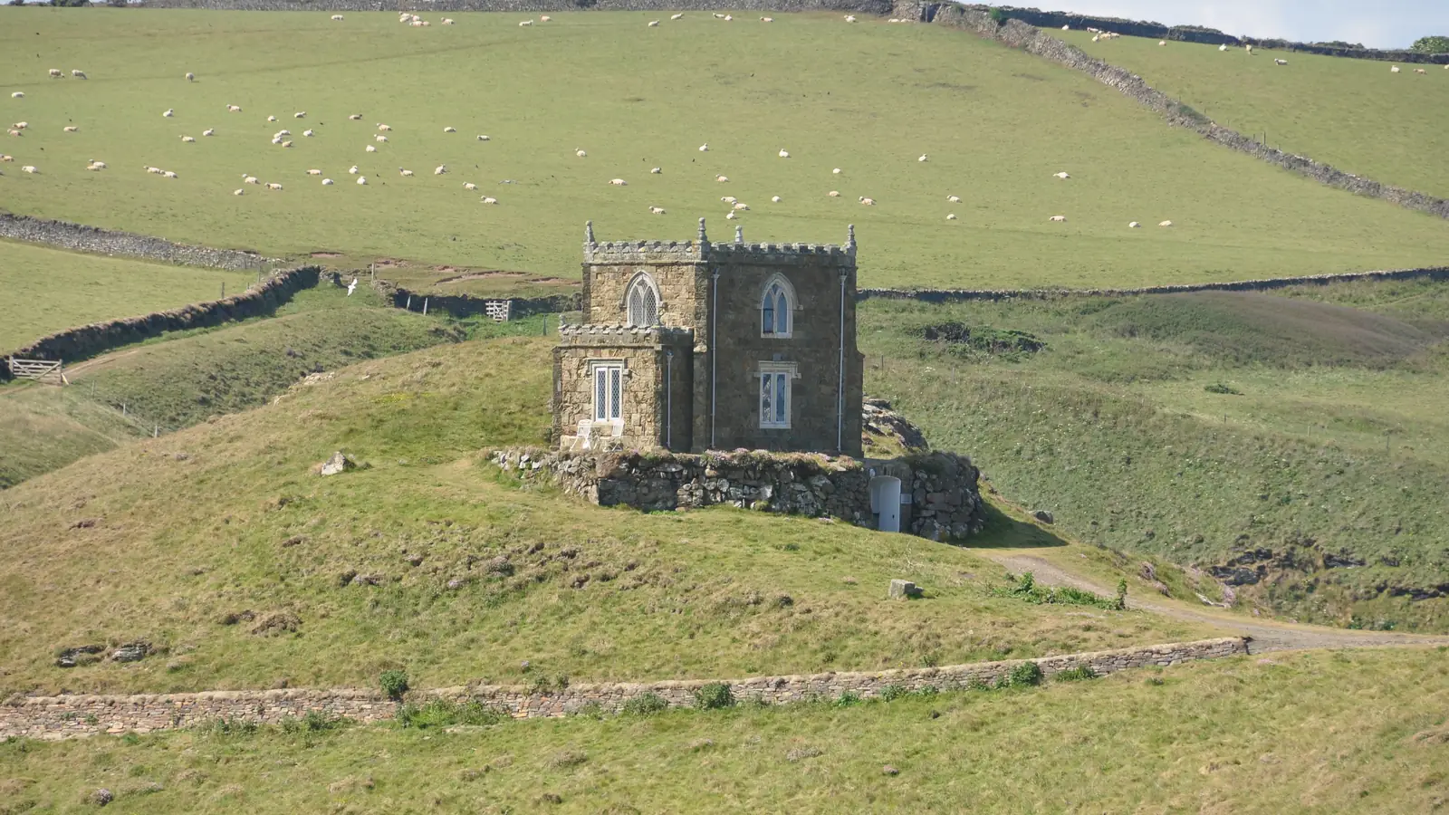 Doyden Castle, a small stone folly on the cliff at Port Quin – Pentire Castle in the series 5 finale.