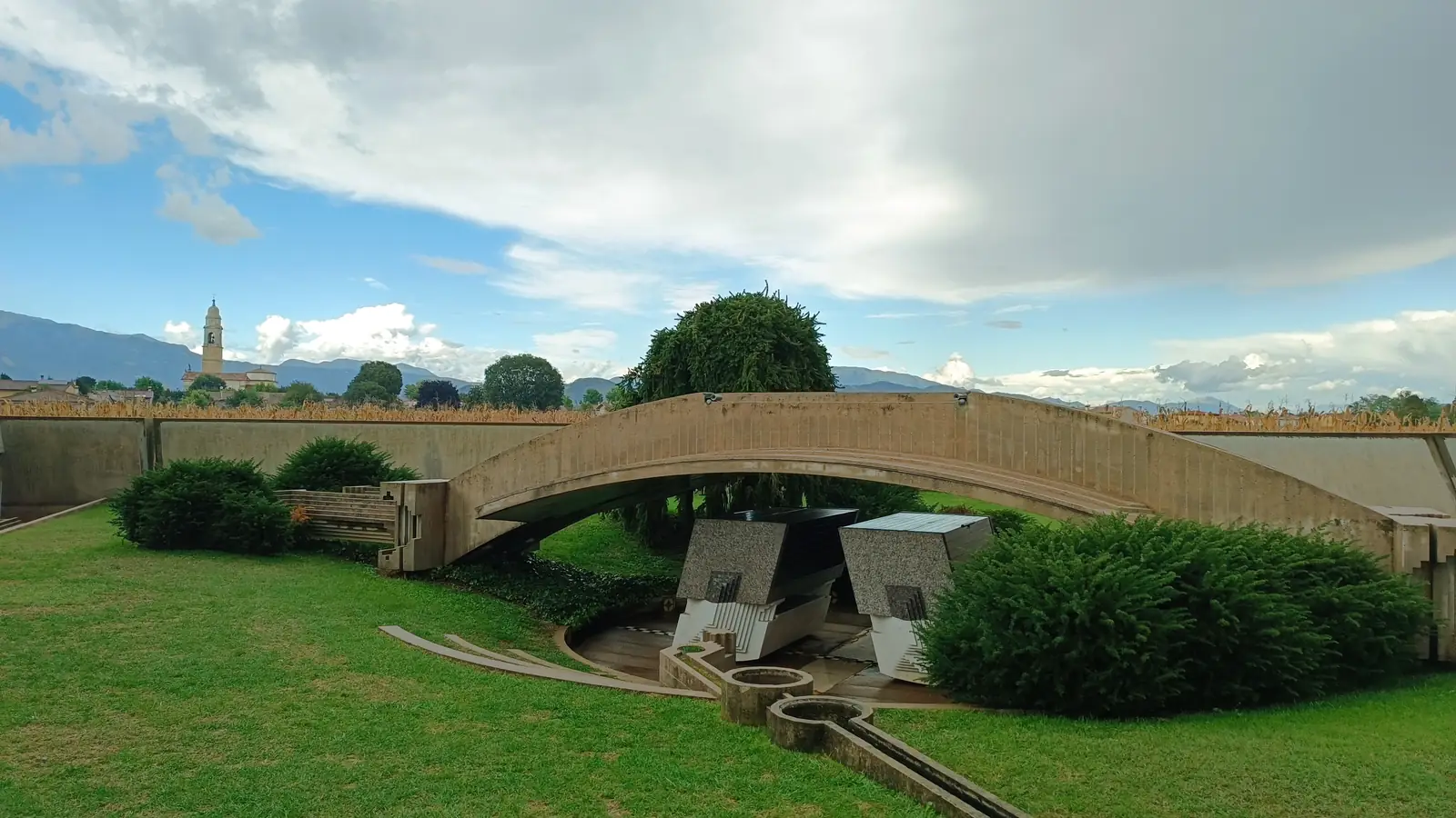 The arched bridge and pools of the Brion tomb at Altivole, the Harkonnen world of Dune: Part Two