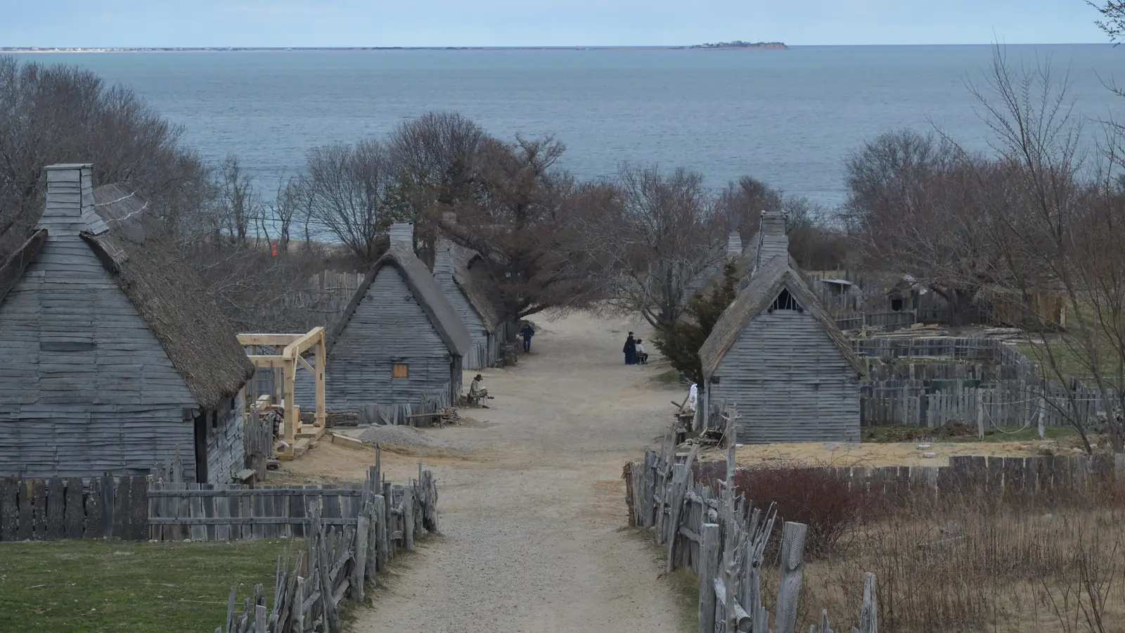 Timber houses and palisade of the 17th-century English village at Plimoth Patuxet, Plymouth – the settlement seen from the air in the Hocus Pocus prologue.