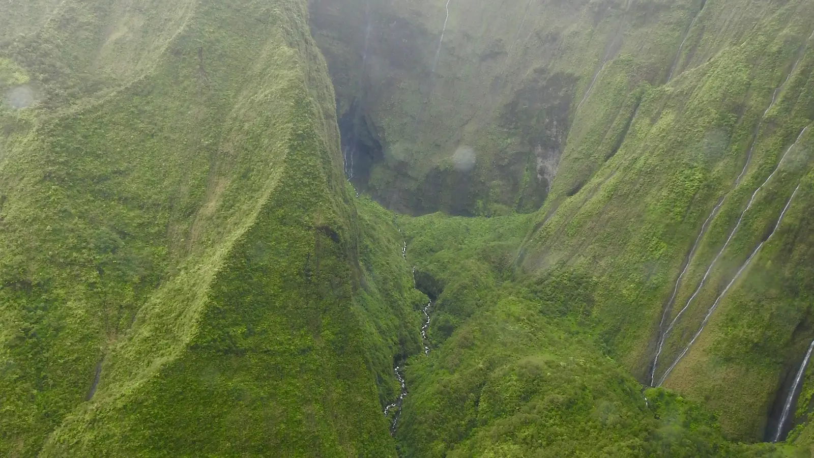 Waterfalls on the crater wall of Mount Waialeale, Kauai – the Blue Hole, where the Jurassic Park gates stood