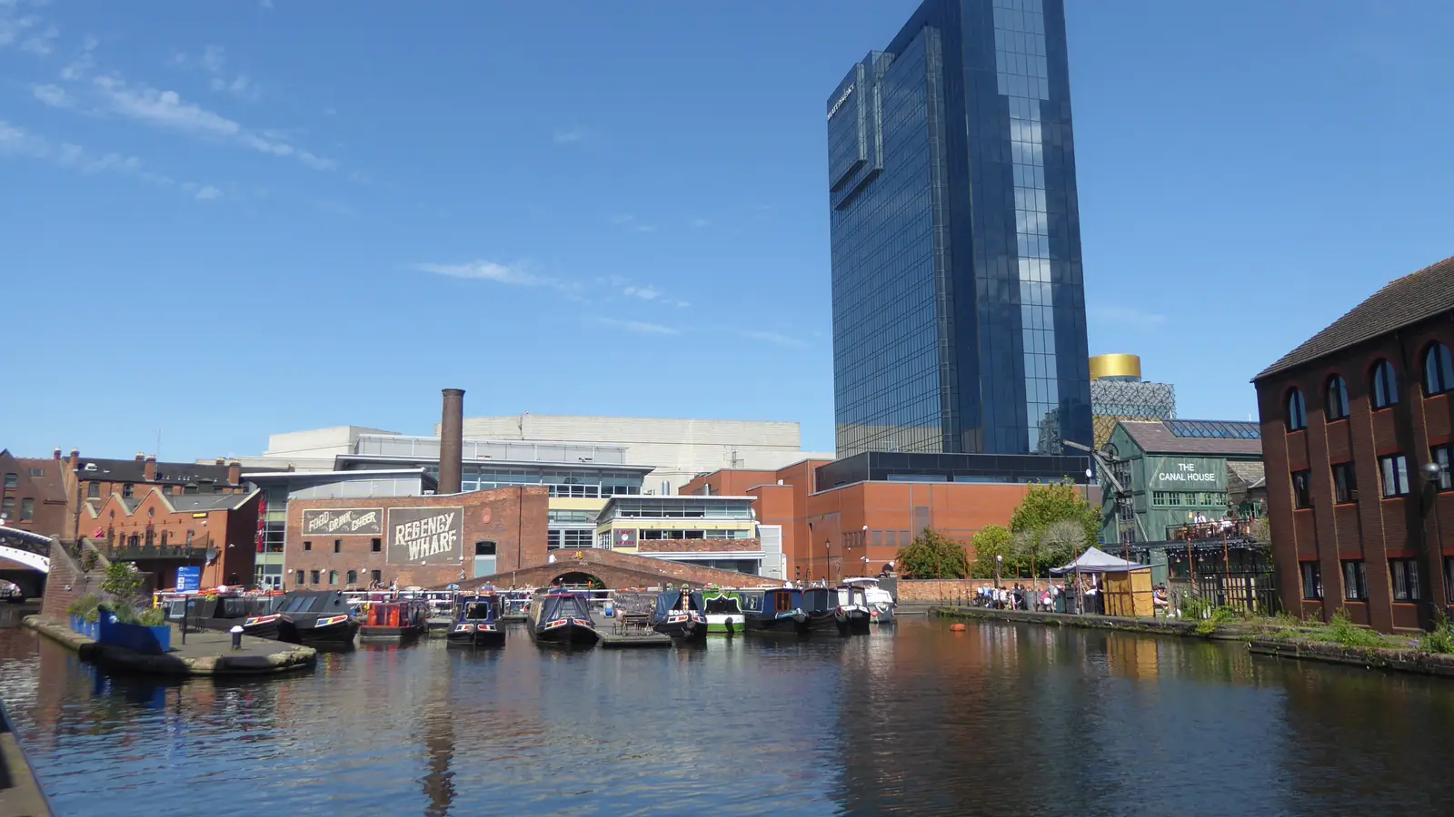 Narrowboats moored at Gas Street Basin in central Birmingham – a location in Peaky Blinders: The Immortal Man.