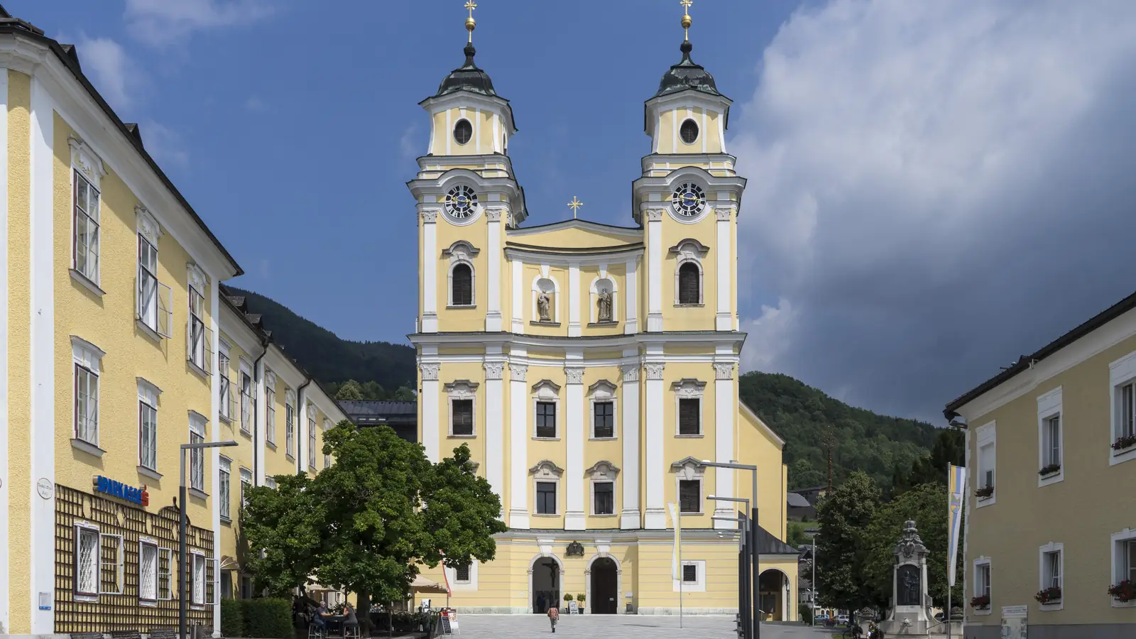 The yellow basilica of St Michael in Mondsee, the wedding church