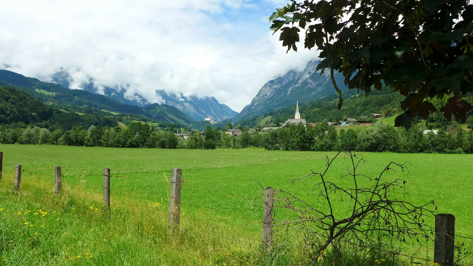 The meadows above Werfen with the Hohenwerfen fortress in the valley, where Do-Re-Mi begins