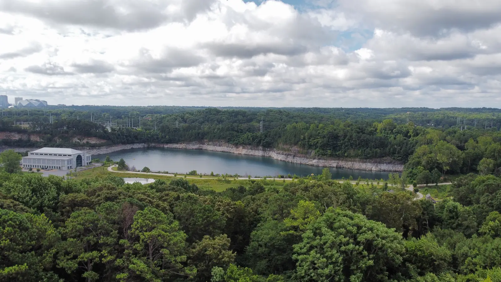 The flooded Bellwood Quarry in Westside Park, Atlanta, with its granite cliffs – the quarry from season one