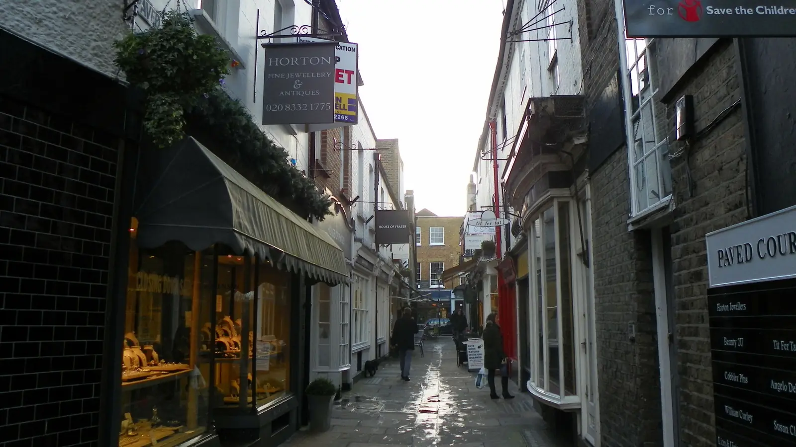 The narrow cobbled lane of Paved Court in Richmond with its small shopfronts – Ted's street, with the black door of 9½ in the show