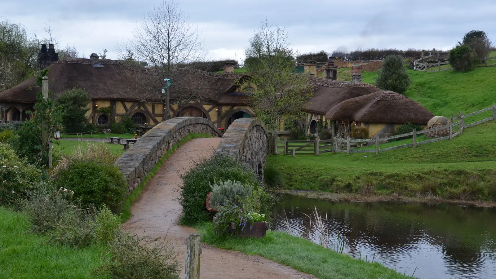 The Green Dragon inn beside the pond at Hobbiton Movie Set, Matamata – the hobbits' pub, built in permanent materials for The Hobbit