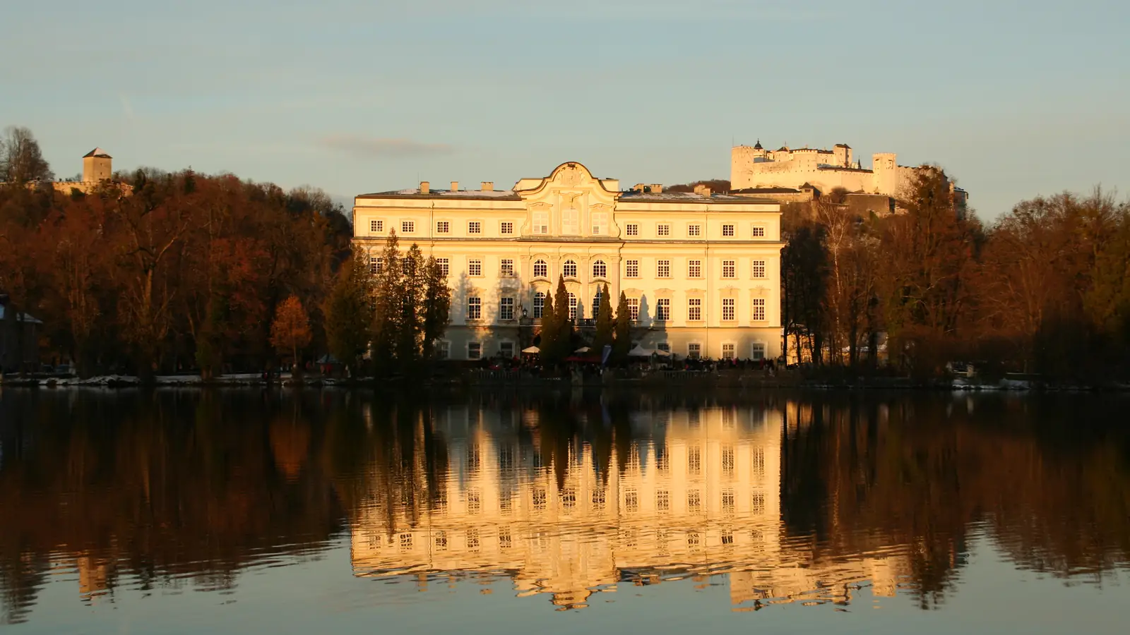 Schloss Leopoldskron across its lake at sunset – the von Trapp villa in The Sound of Music